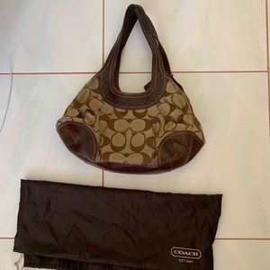 COACH monogrammed shoulder bag.